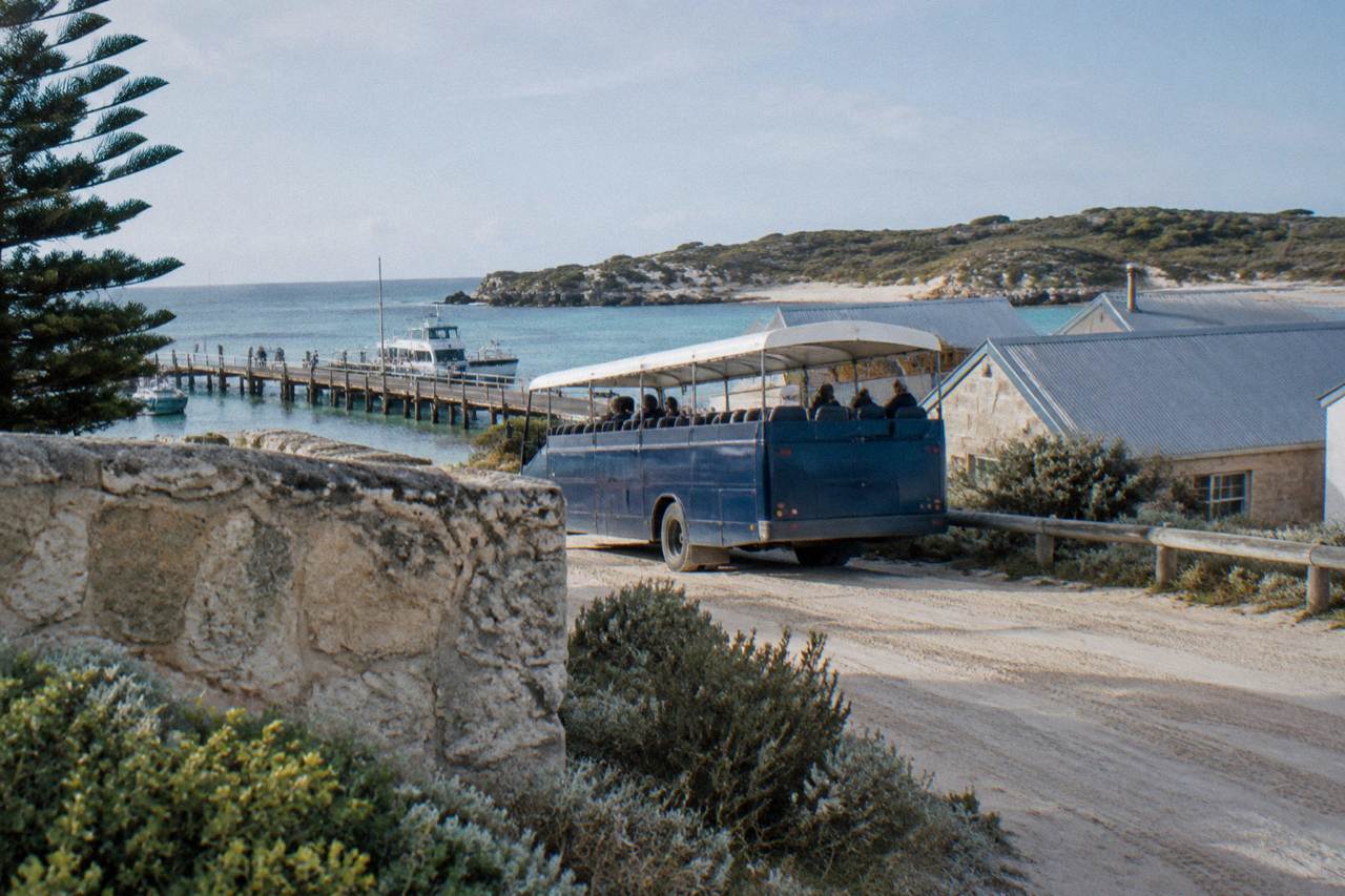 Open-top tour bus parked near the Thomson Bay settlement on Rottnest Island